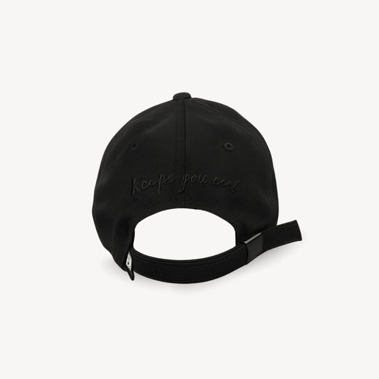 Back view of black obsidian monogram baseball cap with adjustable strap and comfortable fit