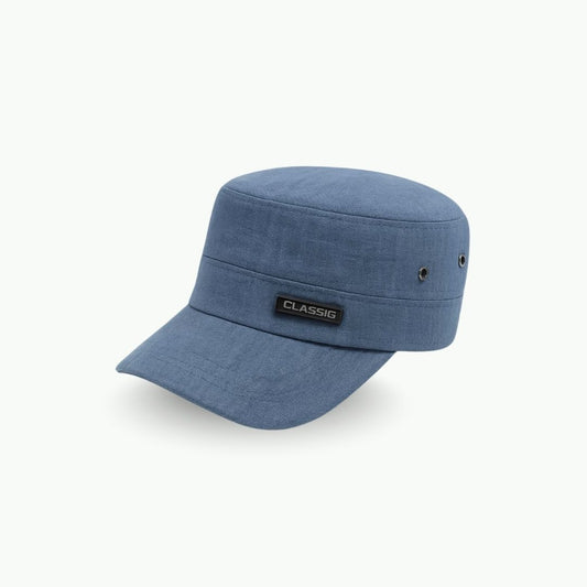 Side view of steel blue cadet cap with short brim and structured military style design