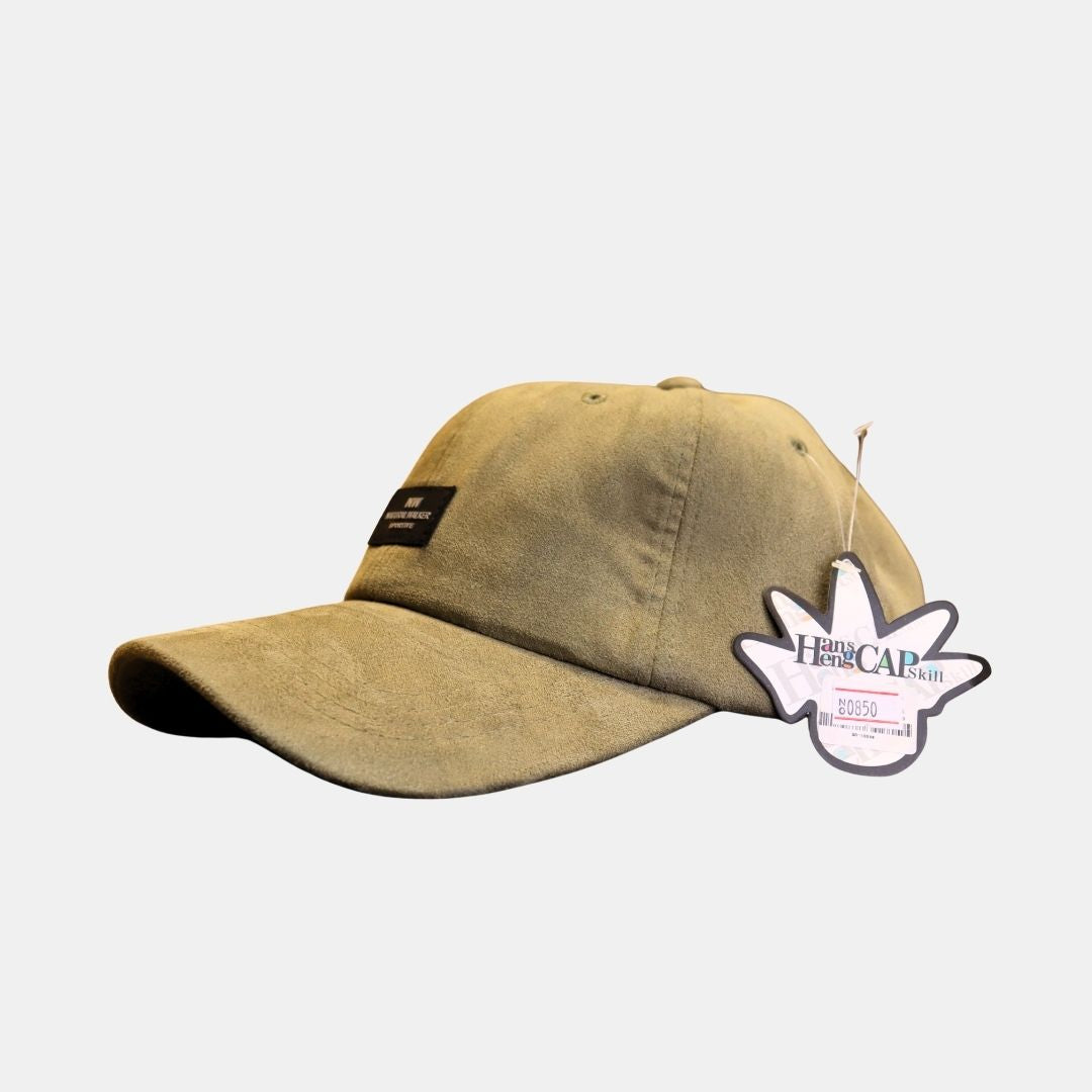 Side view of beige baseball cap with casual everyday style