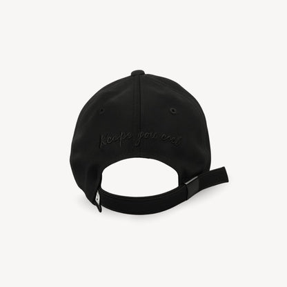 Back view of black obsidian monogram baseball cap with adjustable strap and comfortable fit

