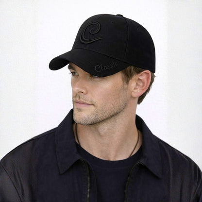 Men’s black obsidian monogram baseball cap front view with stylish logo and curved brim
