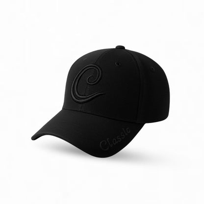 Side view of black obsidian monogram baseball cap with modern casual design