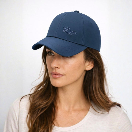 Women’s blue Expert baseball cap front view with embroidered logo and curved brim casual hat
