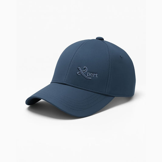 Side view of women’s blue Expert baseball cap with curved brim and minimal logo design