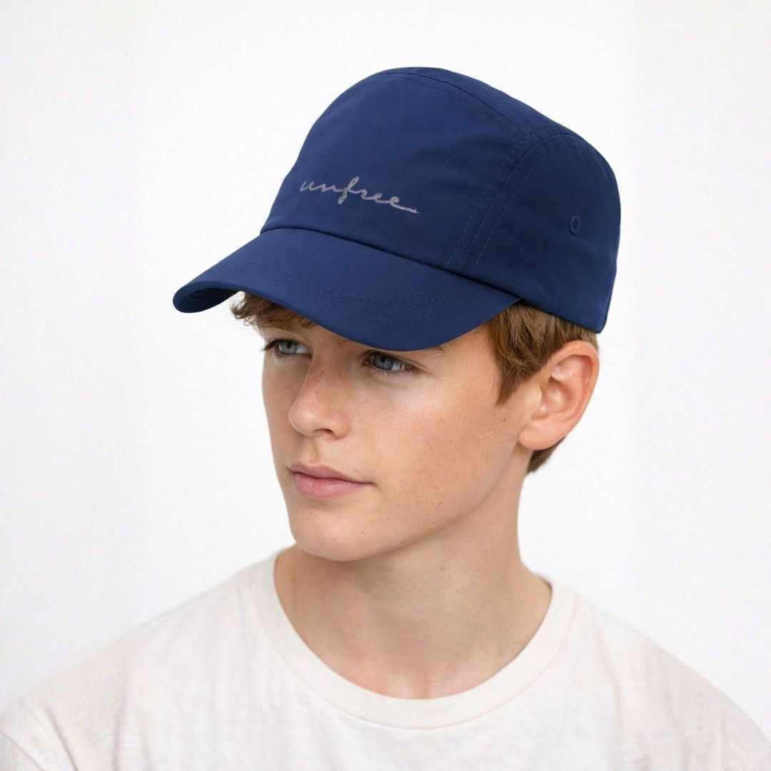 Men’s navy performance cap front view with lightweight breathable design and curved brim sports hat