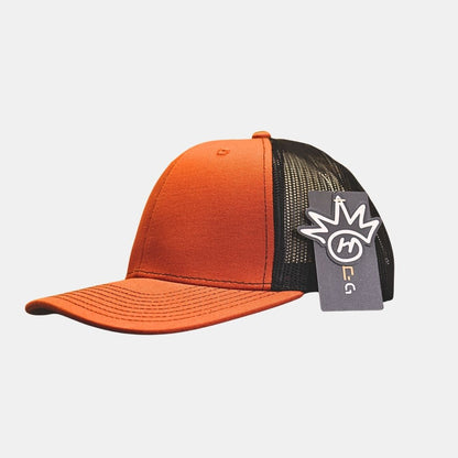 Side view of orange baseball cap with vibrant style