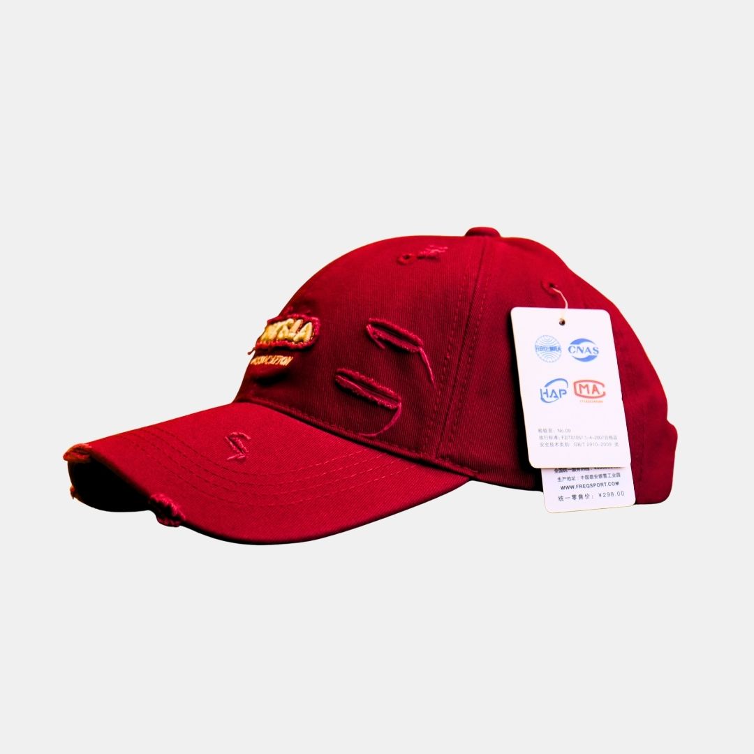  Side view of red distressed baseball cap with embroidery