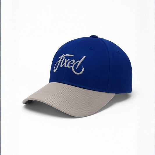 Side view of royal script two-tone baseball cap with fixed embroidery and casual design