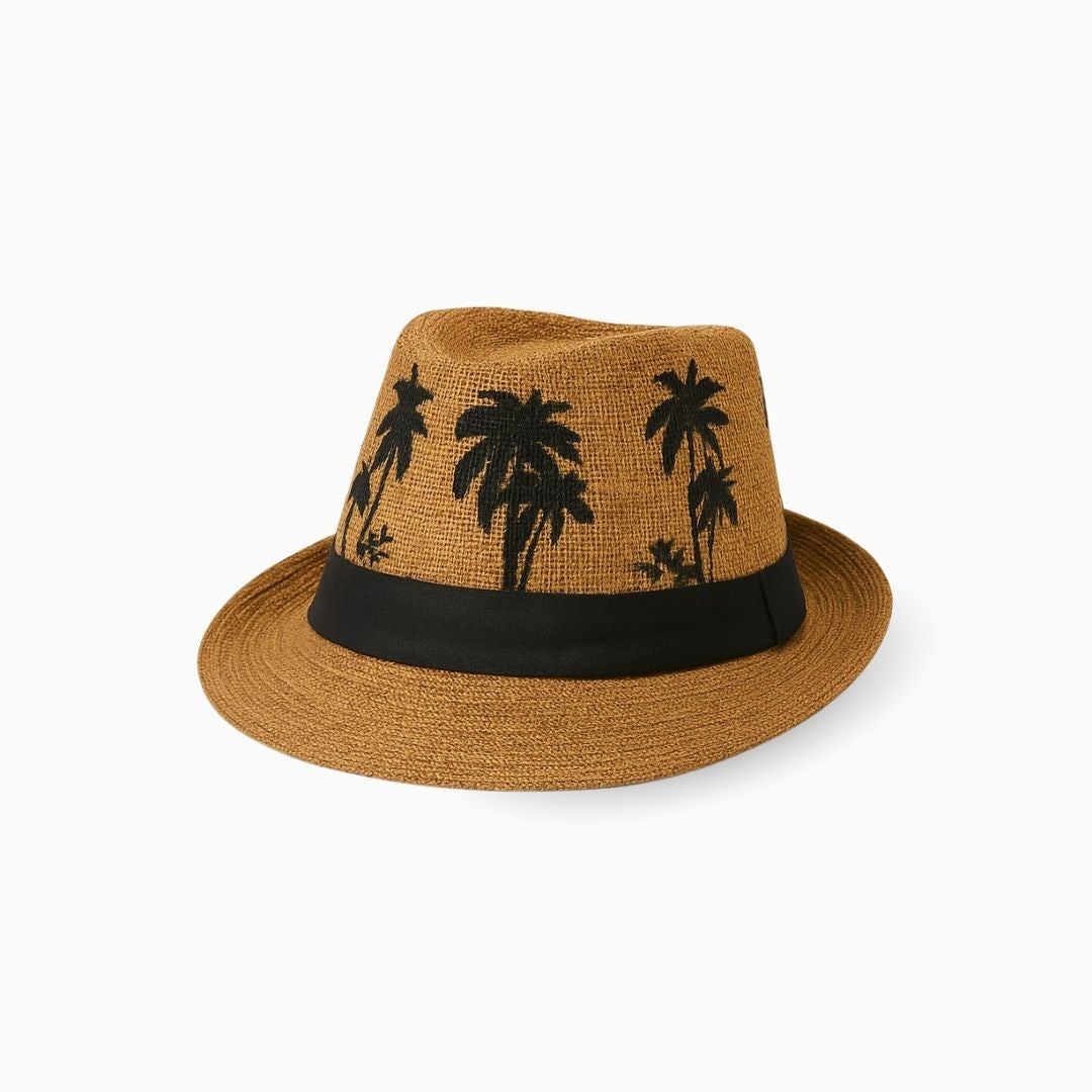 Side view of tan brown straw fedora cap with black band and palm tree print for summer style
