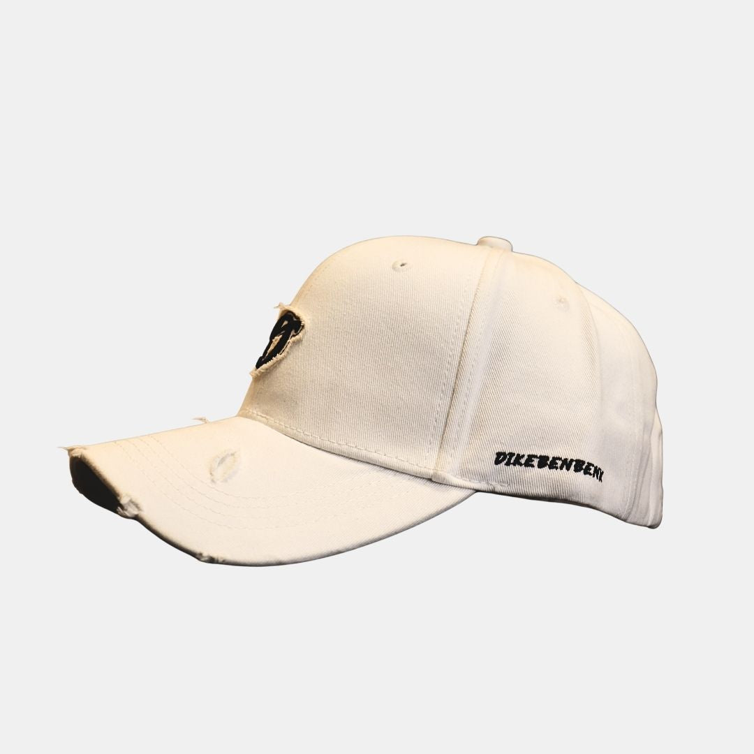 Side view of white D embroidered baseball cap