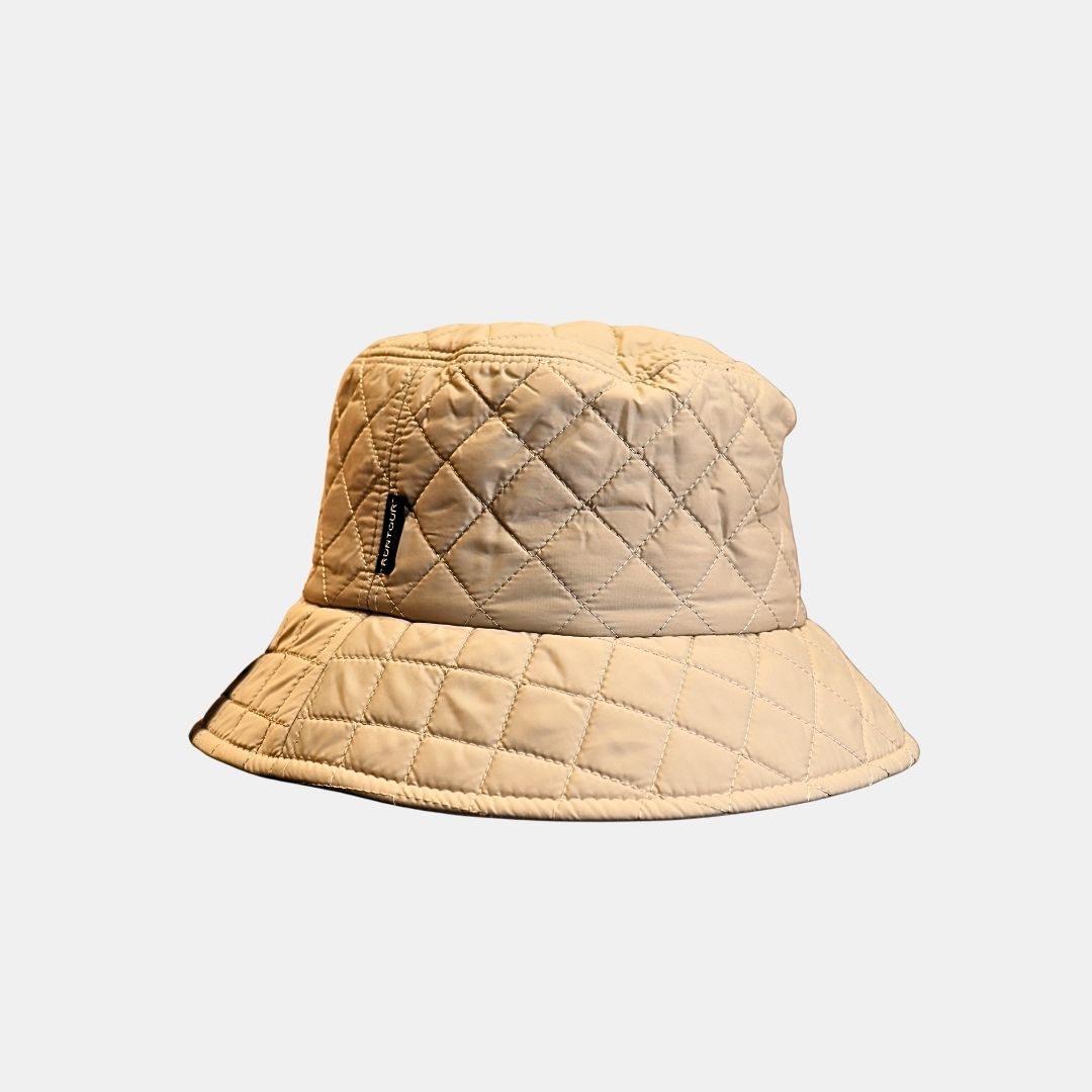 Women’s beige quilted bucket hat front view soft casual design